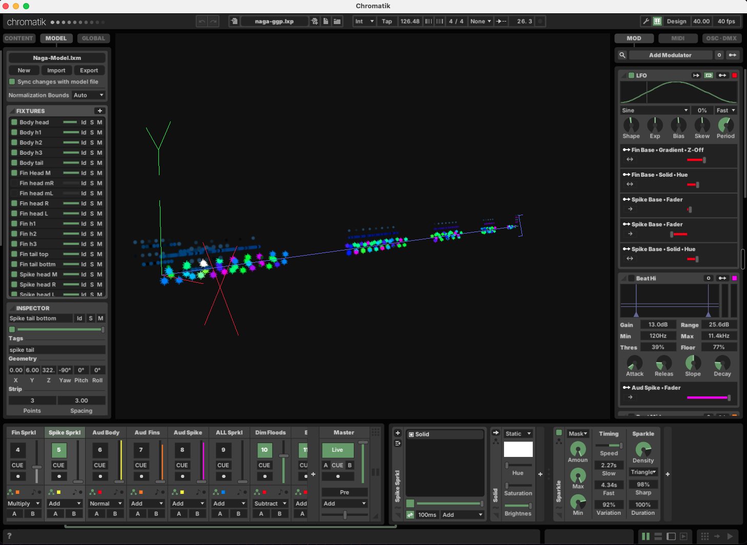 The Naga model open in Chromatik: fixture list on the left, the serpent's pixels in a 3D viewport, audio modulators on the right and a channel mixer along the bottom